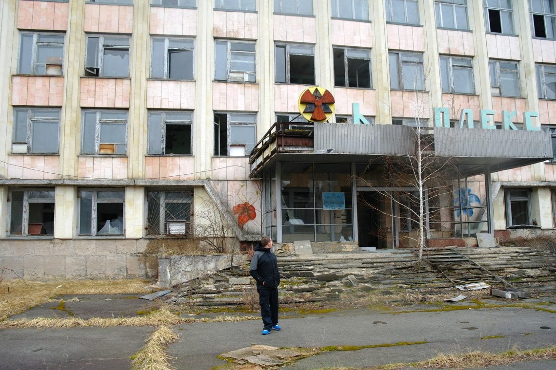 chernobyle lee walking around bleek buildings